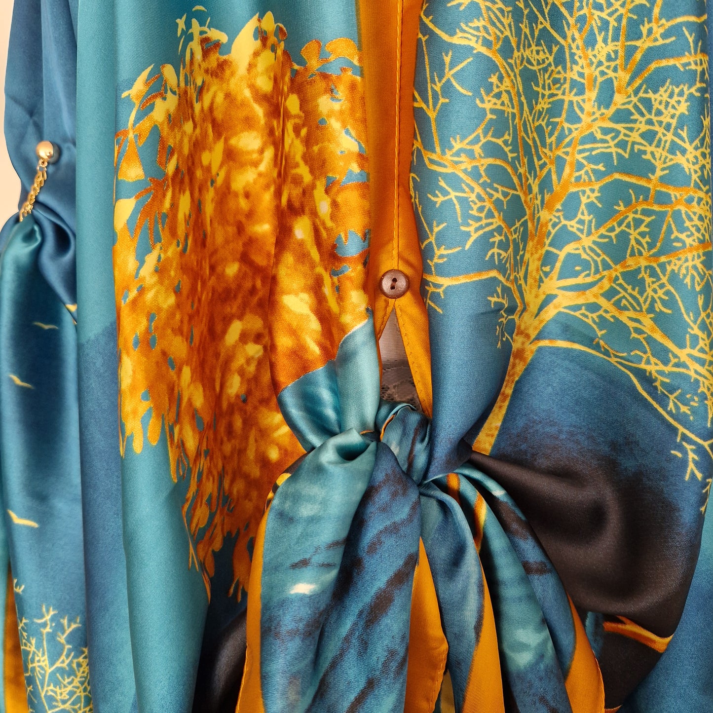 Handmade Boho-style multi-wear kaftan and a blue robe with a golden border, and with botanical, made from a soft cotton-polyester blend
