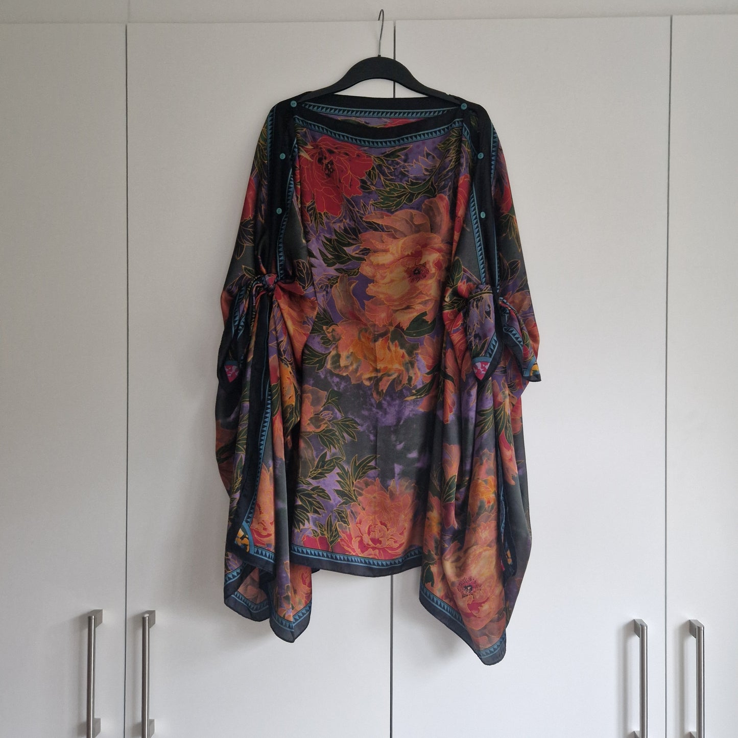 Handmade Boho-style multi-wear kaftan and a multi coloured warm coloured robe, with botanical, made from a soft cotton-polyester blend
