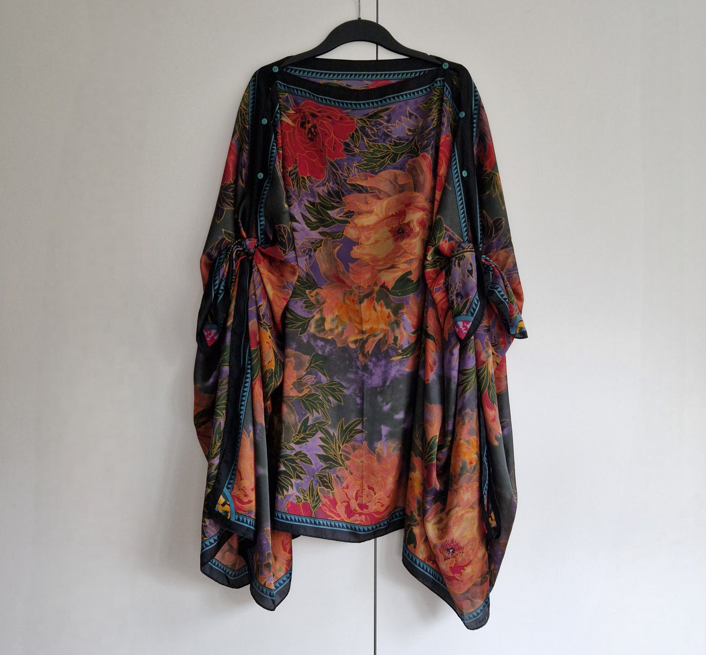Handmade Boho-style multi-wear kaftan and a multi coloured warm coloured robe, with botanical, made from a soft cotton-polyester blend