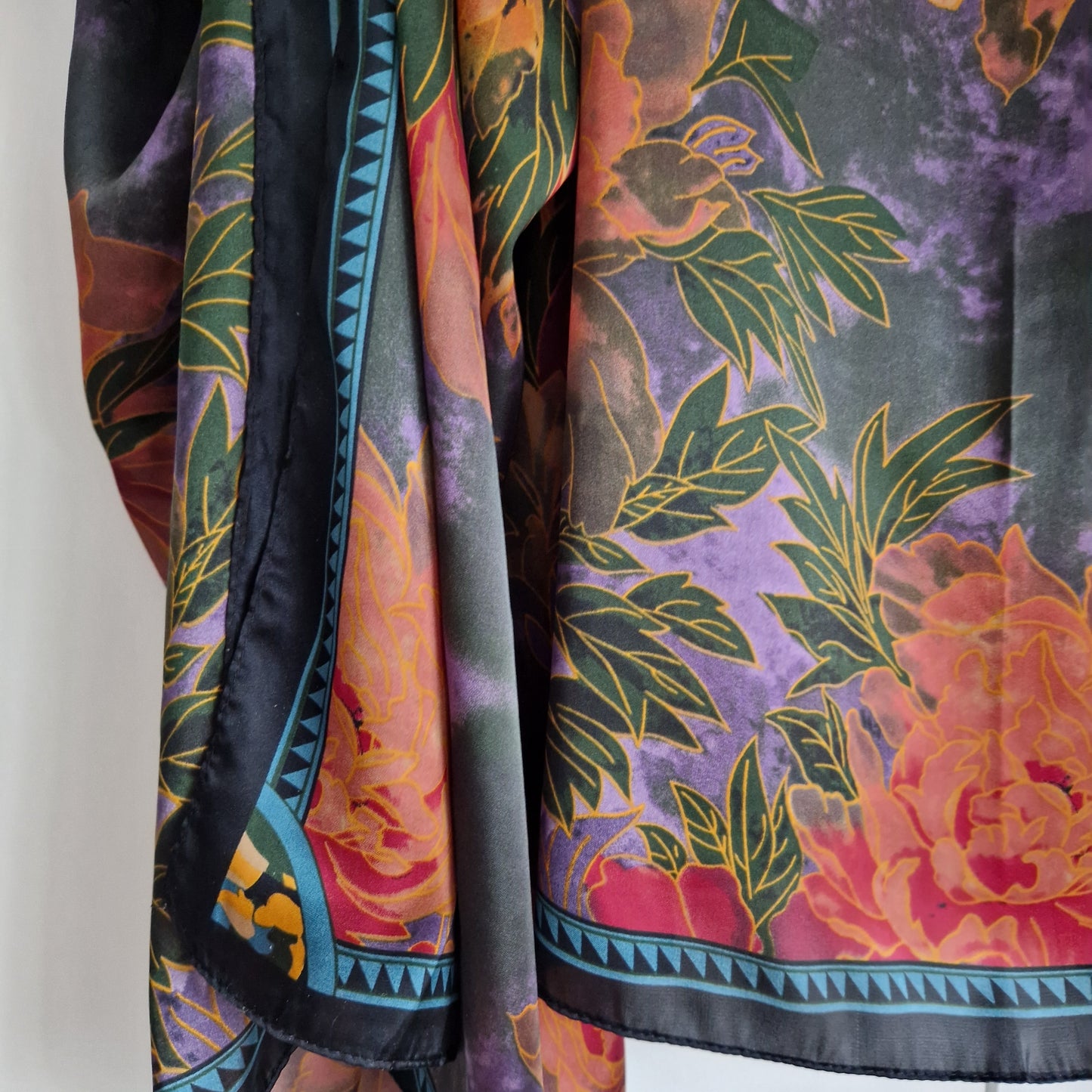 Handmade Boho-style multi-wear kaftan and a multi coloured warm coloured robe, with botanical, made from a soft cotton-polyester blend