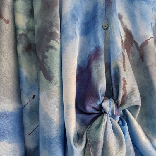 Handmade Boho-style multi-wear kaftan and robe in blue with golden border and botanical cherry blossom print, made from a soft cotton-polyester blend