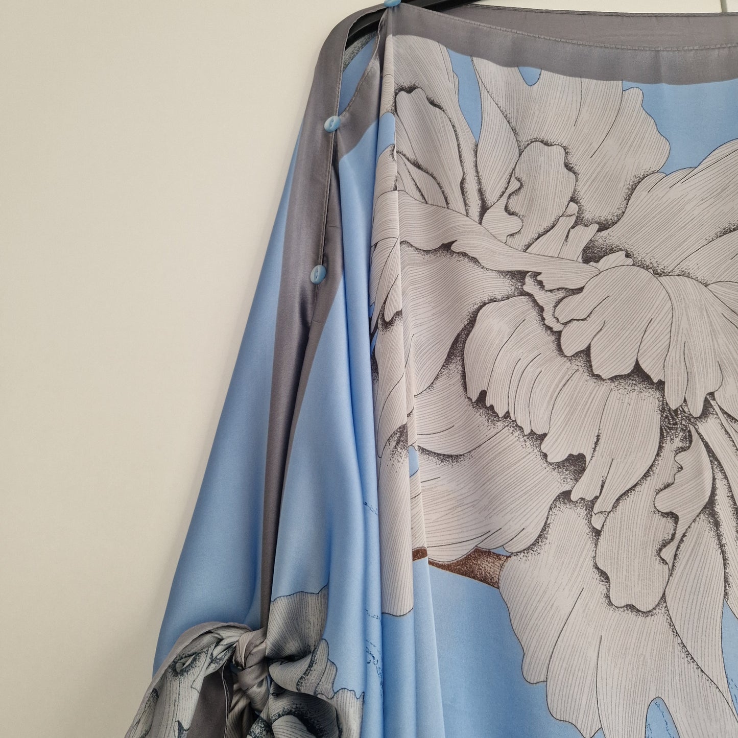 Handmade Boho-style multi-wear kaftan and a
silver border with sky blue coloured robe, with botanical, made from a soft cotton-polyester blend