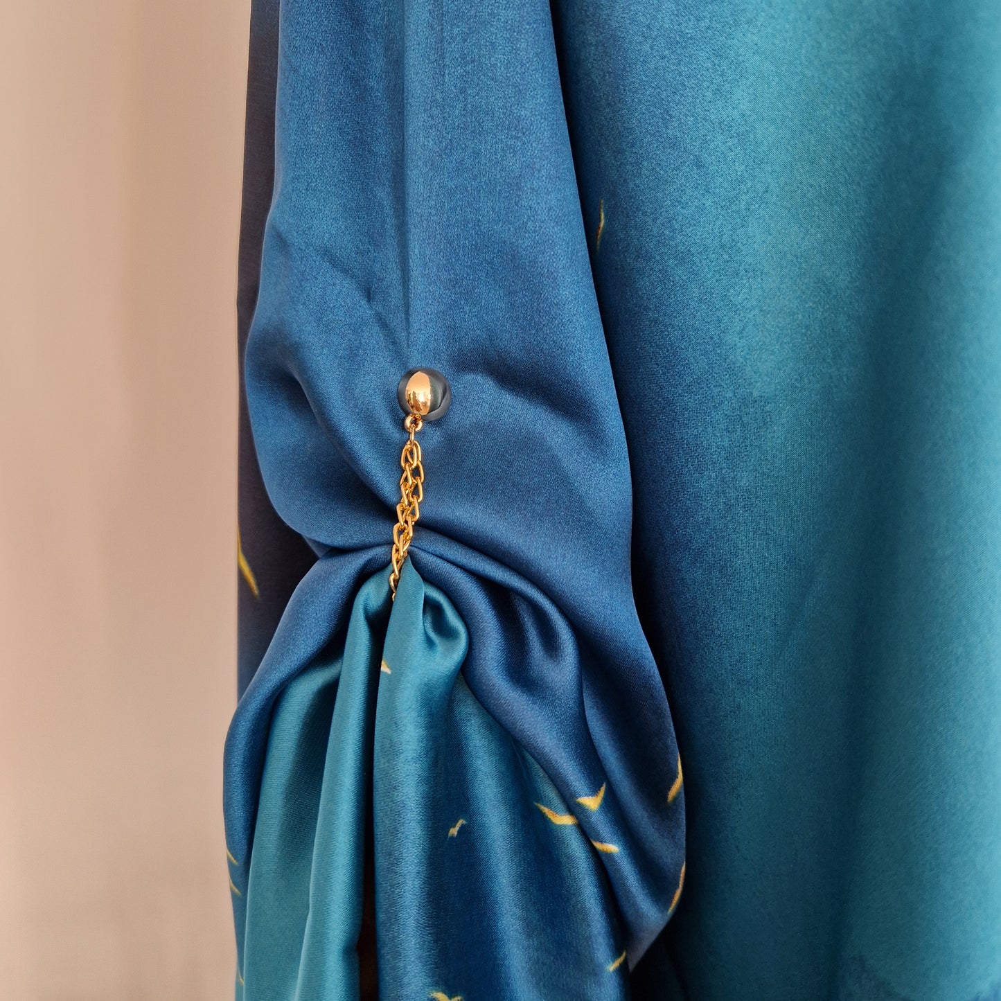 Handmade Boho-style multi-wear kaftan and a blue robe with a golden border, and with botanical, made from a soft cotton-polyester blend