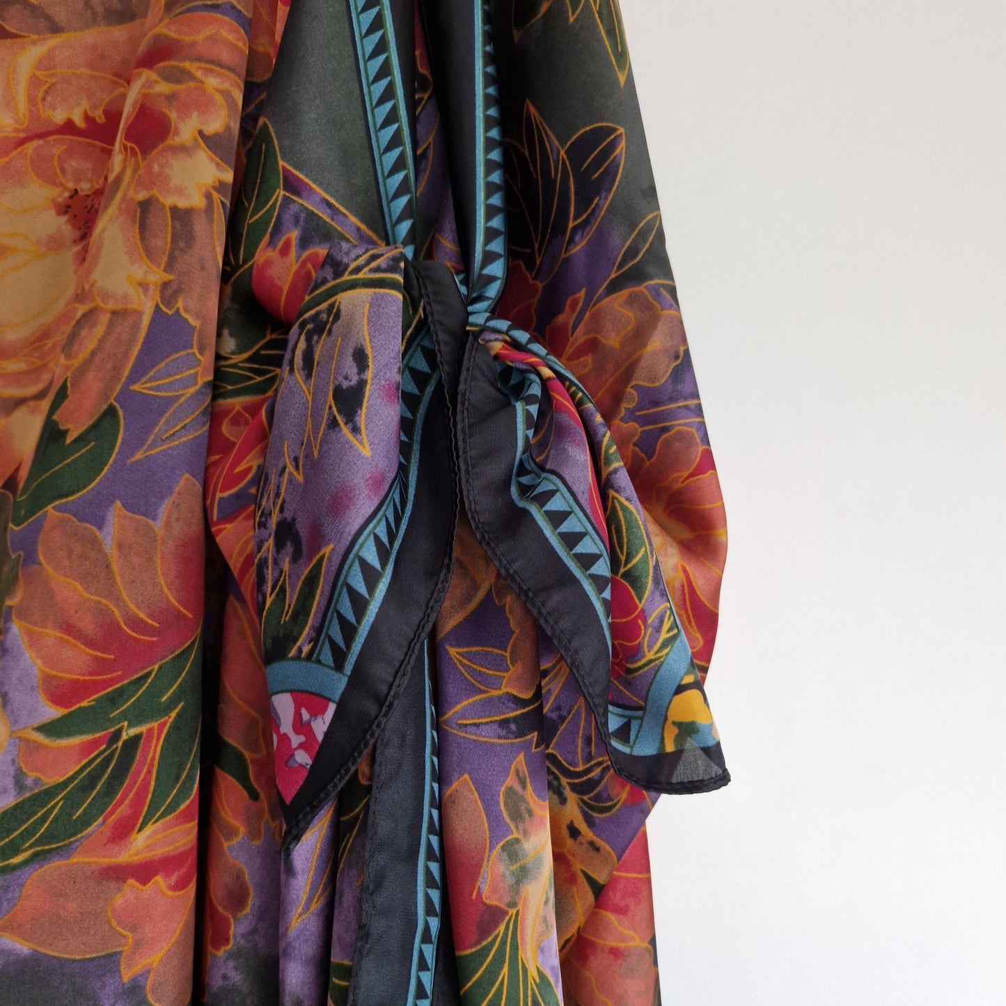 Handmade Boho-style multi-wear kaftan and a multi coloured warm coloured robe, with botanical, made from a soft cotton-polyester blend