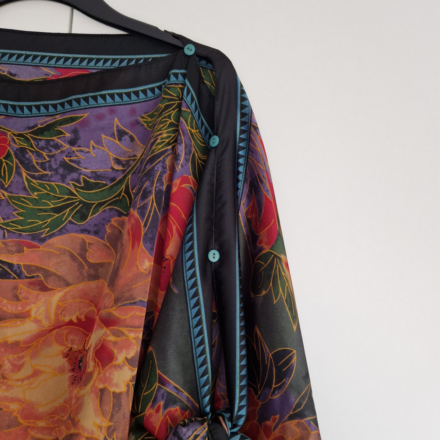 Handmade Boho-style multi-wear kaftan and a multi coloured warm coloured robe, with botanical, made from a soft cotton-polyester blend