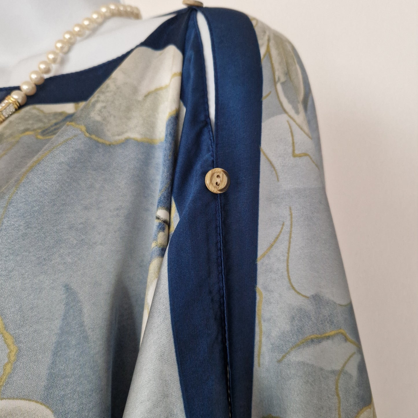 Handmade Boho-style multi-wear kaftan featuring a champagne robe and a blue border, crafted from a soft cotton-polyester blend.