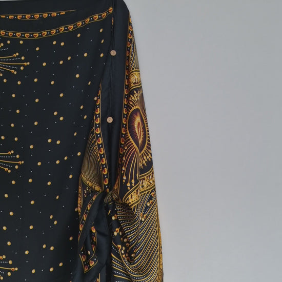 Handmade Boho-style multi-wear kaftan and a multi coloured warm coloured robe, with botanical, made from a soft cotton-polyester blend
