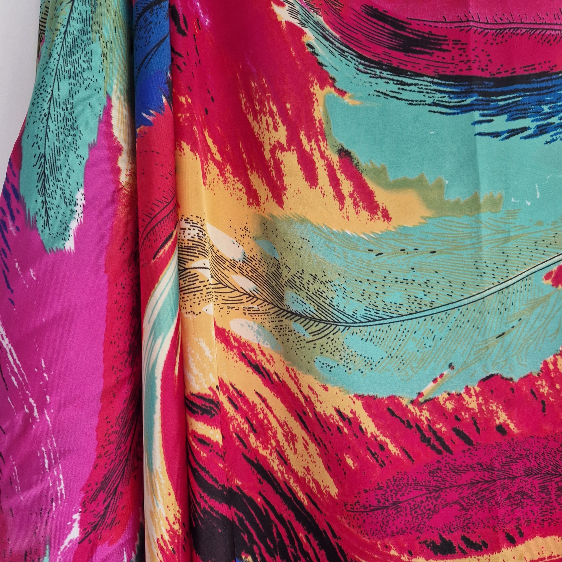 Handmade Boho-style multi-wear kaftan and robe  made from a soft cotton-polyester blend  in rainbow colours